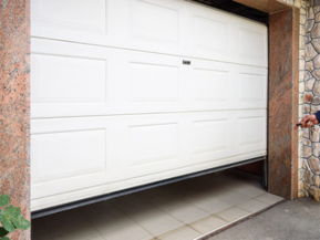 pose porte de garage sectionnelle