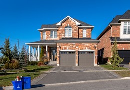 Quelles sont les dimensions à prendre en compte pour une porte de garage enroulable ?